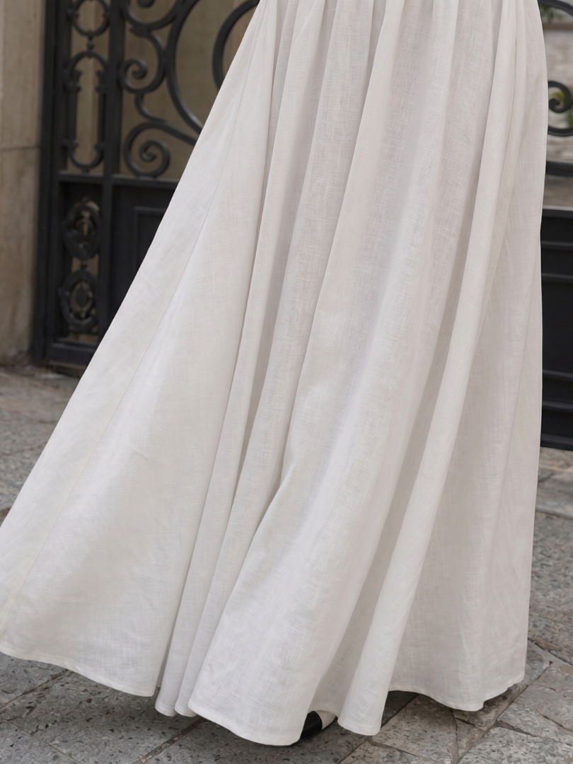 Jeven | Vestido midi sin mangas con escote halter y cuerpo ajustado
